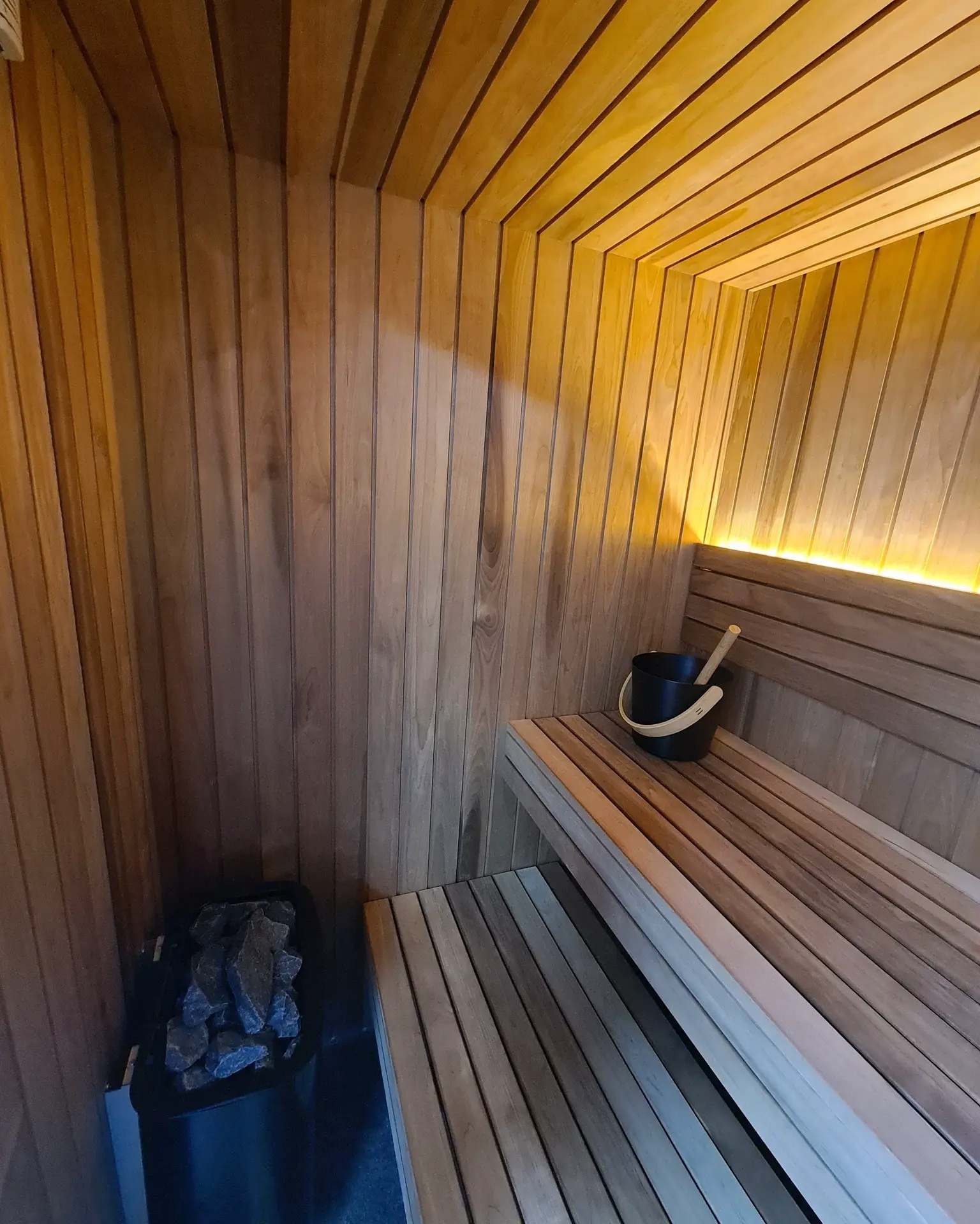 Infrared sauna with therapeutic cedar wood interior